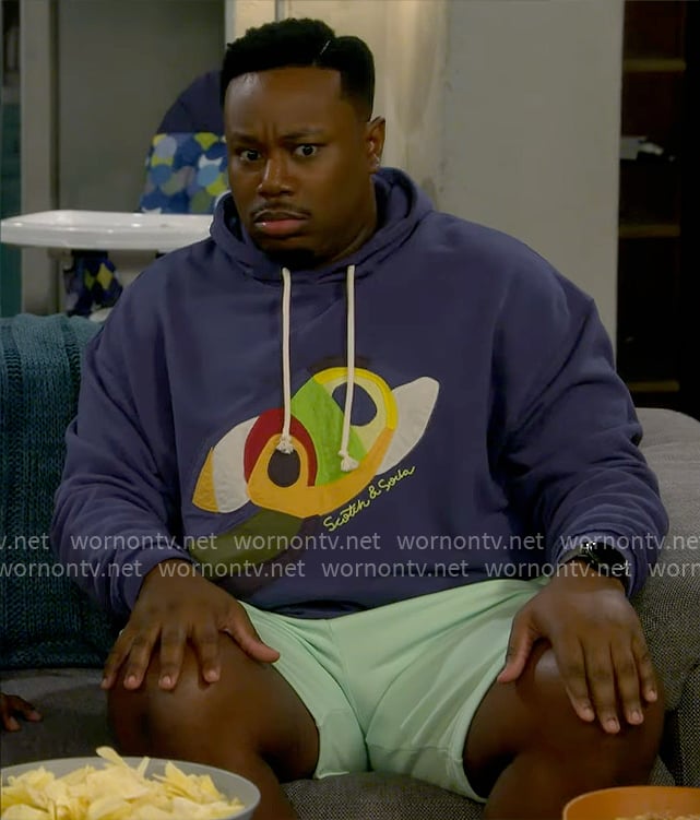 Marty's colorful applique hoodie on The Neighborhood