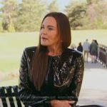 Meredith’s black leather jacket and mini skirt on The Real Housewives of Salt Lake City