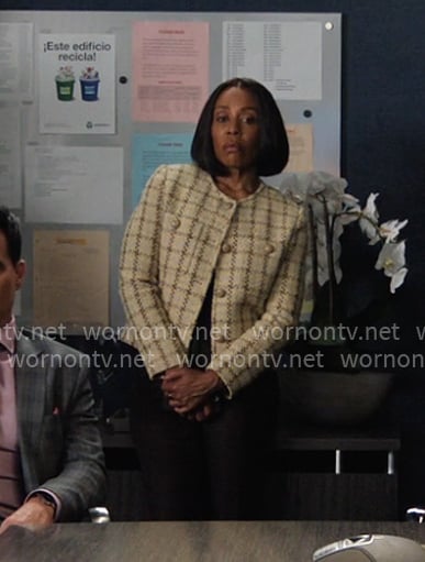 Mia’s checked tweed jacket on The Morning Show