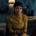 Millan’s yellow asymmetrical sweatshirt on Alls Fair