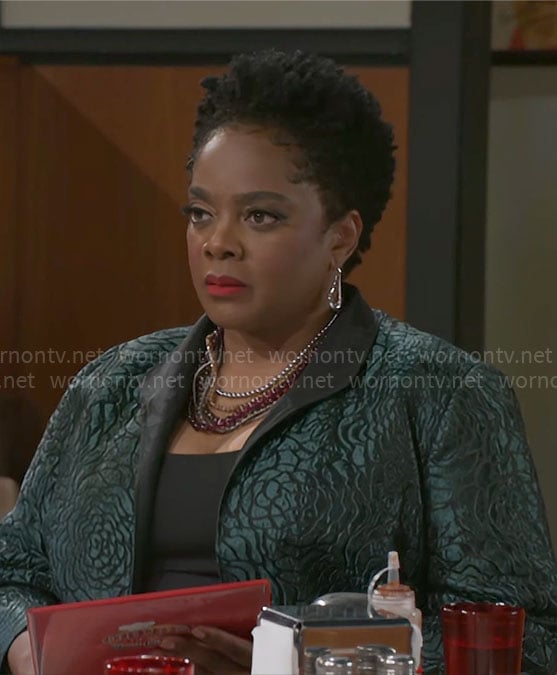 Mona’s green jacquard jacket on Beyond the Gates