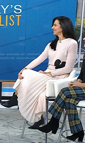 Natalie's pink heart print sweater and pleated skirt on Today