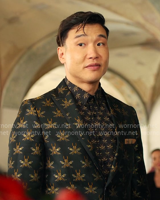 Nicholas's black and gold bee print suit on Loot
