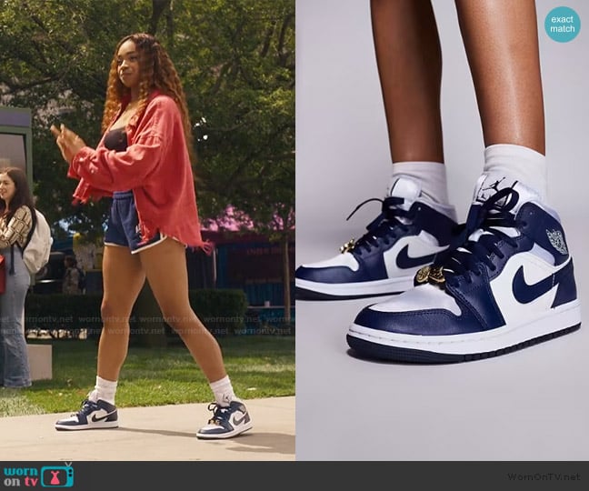 Nike Air Jordan 1 Mid sneakers in white and navy worn by Lisa (Simone Joy Jones) on Bel-Air