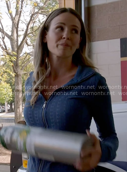 Novak's blue cable-knit zip up sweater on Chicago Fire