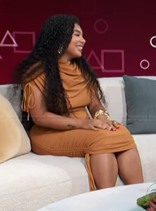 Perla Figuereo’s brown ruched dress on Access Hollywood