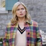 Sam’s colorful plaid jacket and v-neck sweater on Ghosts