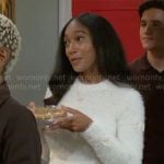 Samantha’s white fluffy sweater and checked skirt on Beyond the Gates