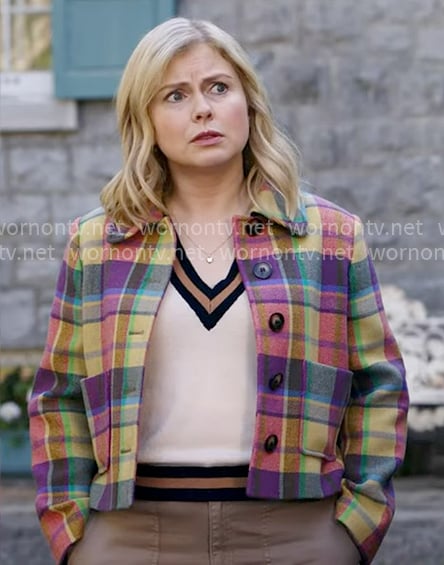 Sam’s colorful plaid jacket and v-neck sweater on Ghosts
