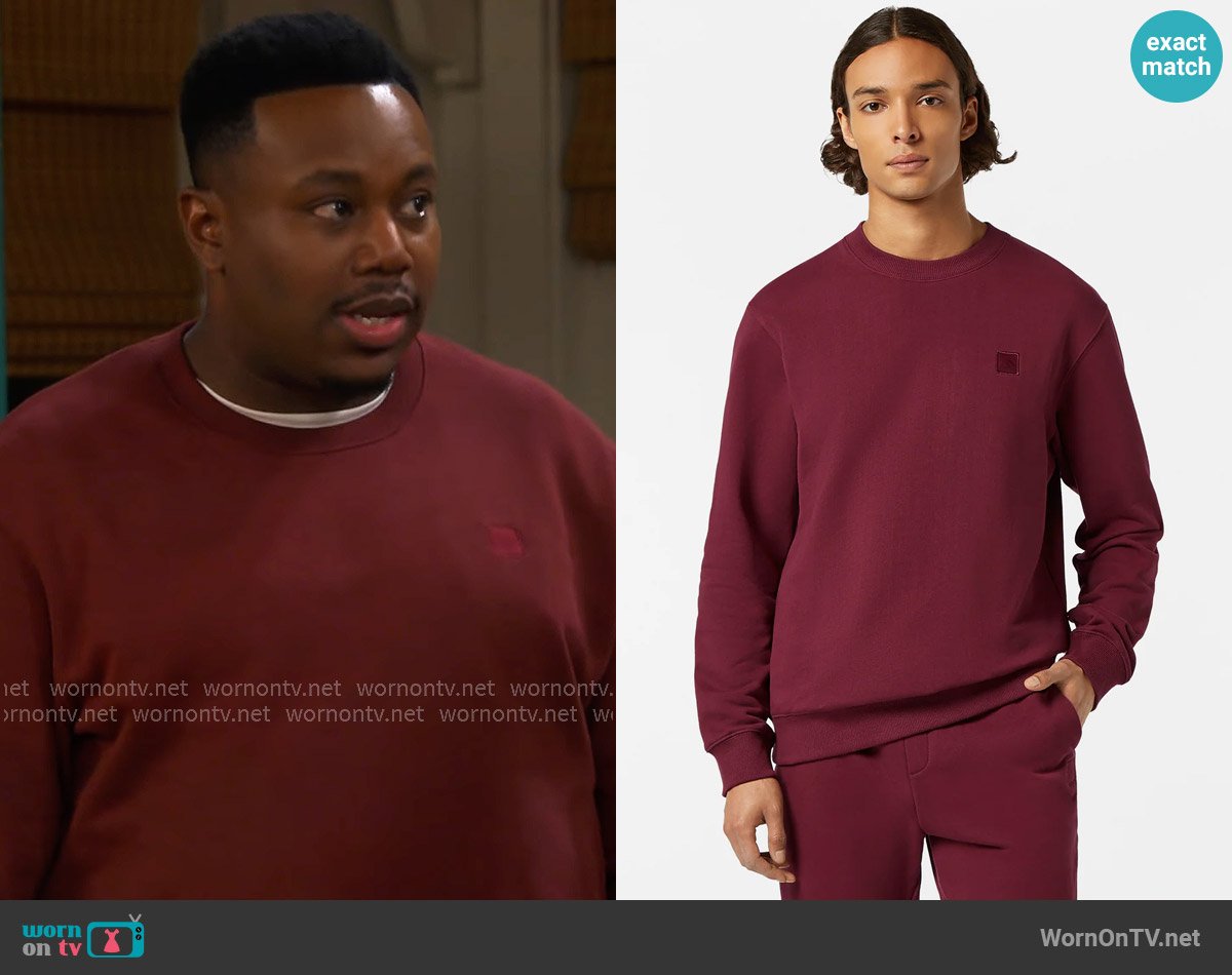 Scotch & Soda Logo Badge Crewneck Sweatshirt in Bordeaux worn by Marty (Marcel Spears) on The Neighborhood