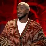 Scott’s orange ribbed cardigan on Access Hollywood