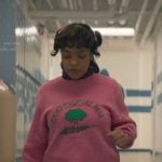 Erica’s pink print sweatshirt and purple sneakers on Stranger Things