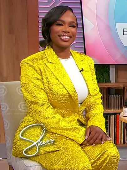 Shaina's yellow shiny blazer and pants on Sherri