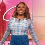 Sherri’s asymmetric denim skirt and printed top on Sherri