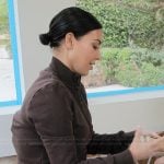 Kim’s brown cropped jacket and pants on The Kardashians