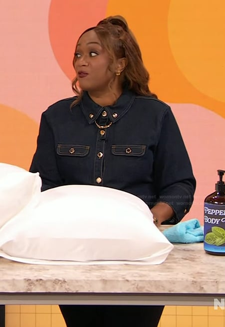 Sunny Anderson's denim shirt with chain detail on The Drew Barrymore Show