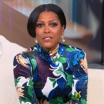 Tamron’s floral print bodysuit and pants on Tamron Hall Show