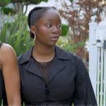 Naima’s black tie waist shirtdress on Reasonable Doubt