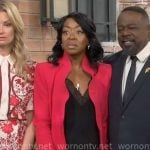 Tina’s red ruffled suit on The Neighborhood