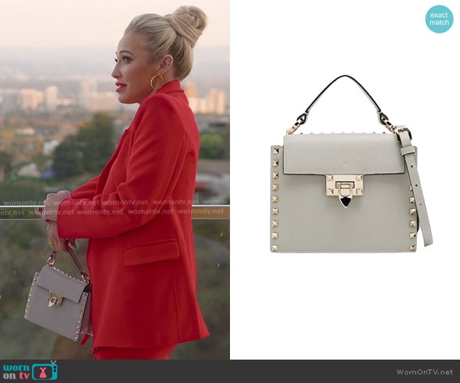 Valentino Rockstud Top Handle Bag worn by Mary Fitzgerald on Selling Sunset