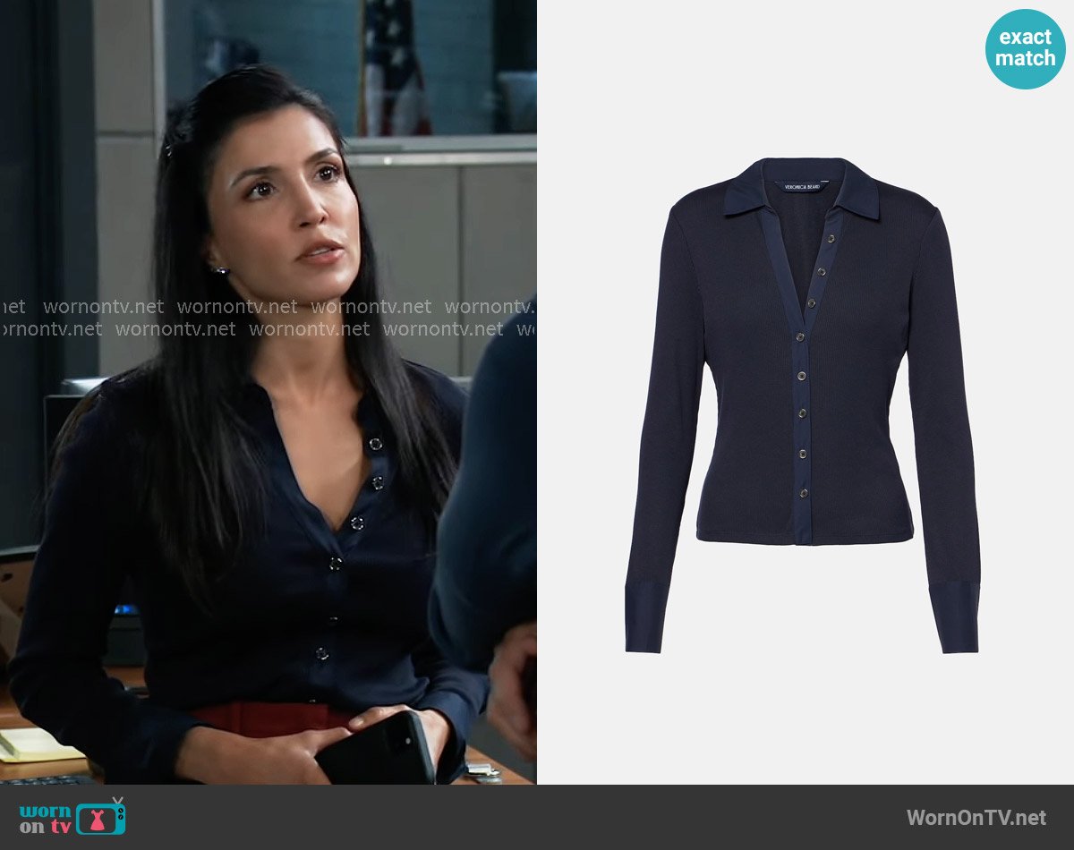 Justine’s navy button front top on General Hospital