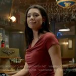 Violet’s red cowl-neck top on Chicago Fire