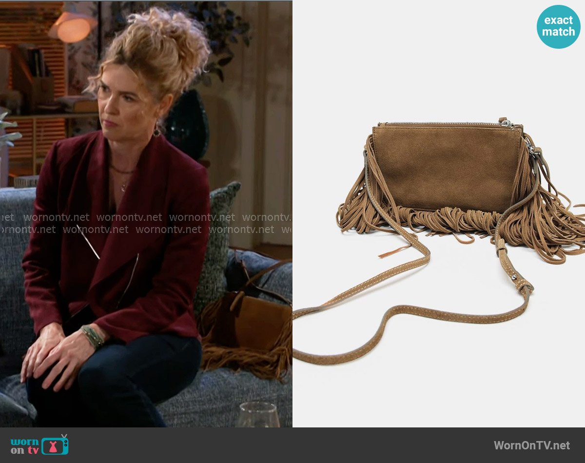 Zara Fringed Split Suede Mini Crossbody Bag worn by Jan Morgan (Jerri Tubbs) on Beyond the Gates
