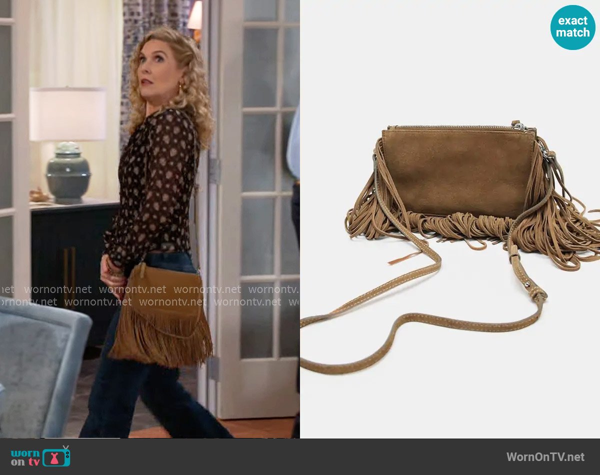 Zara Fringed Split Suede Mini Crossbody Bag worn by Jan Morgan (Jerri Tubbs) on Beyond the Gates