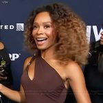 Zuri’s brown one shoulder cutout dress on Access Hollywood