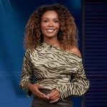 Zuri’s animal print top on Access Hollywood