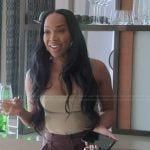 Malika’s beige cami on The Kardashians