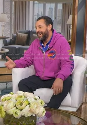 Adam Sandler’s print polo and pink hoodie on Good Morning America