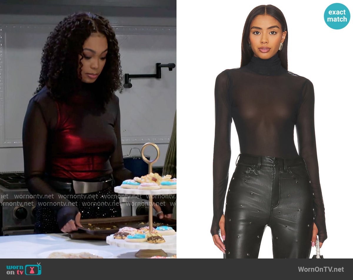 Chelsea’s black mesh top on Beyond the Gates