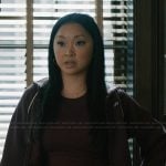 Peyton's burgundy track jacket on Elsbeth