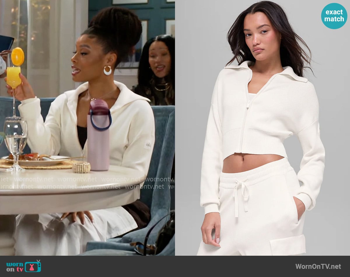 Alo Scholar Knit Cropped Full Zip Jacket in Ivory worn by Eva Thomas (Ambyr Michelle) on Beyond the Gates