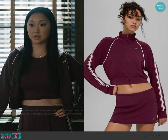 Alo Yoga Track Star Full Zip Jacket in Burgundy worn by Peyton Ramsey (Lana Condor) on Elsbeth