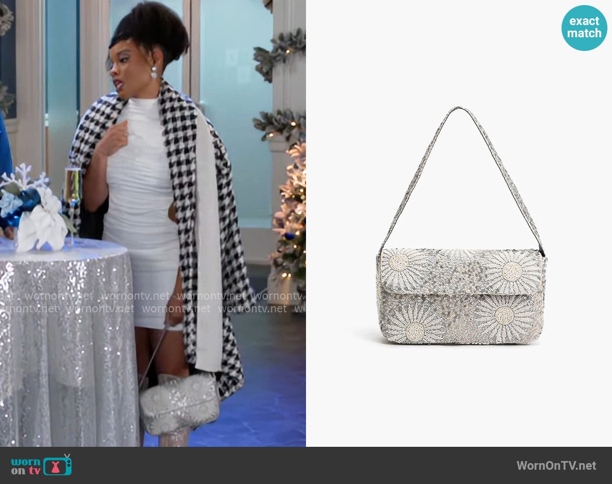 America & Beyond Ivory Petal Frostwork Shoulder Bag worn by Eva Thomas (Ambyr Michelle) on Beyond the Gates