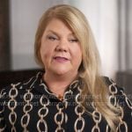 Andrea Swift’s chain print shirt on The End of an Era