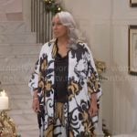 Anita’s black, white, and gold printed coat and pants for NYE on Beyond the Gates
