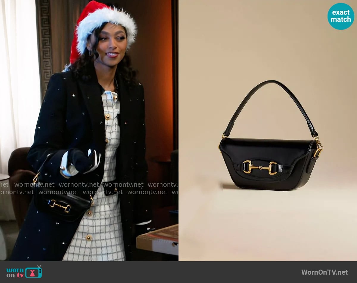 Anthropologie The Delilah Bag Horsebit Edition worn by Kat Richardson (Colby Muhammad) on Beyond the Gates