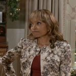 Tracy’s floral jacket on Beyond the Gates