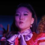 Mindy’s heart embellished earrings on Emily in Paris