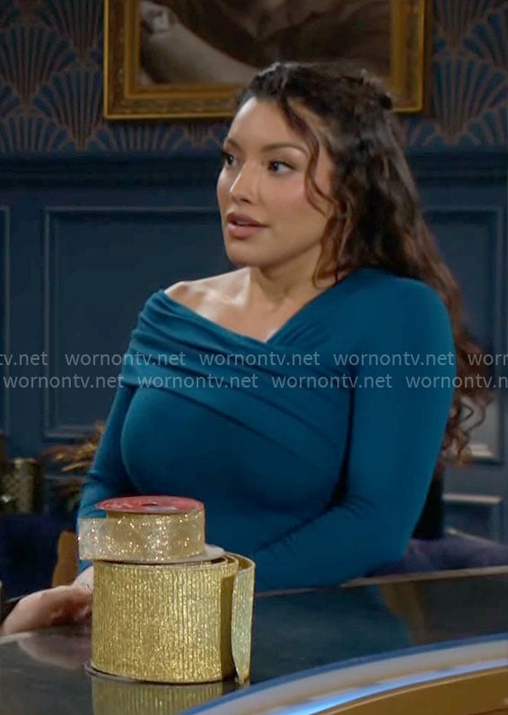 Audra’s teal asymmetric shoulder dress on The Young and the Restless