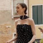 Emily’s black polka dot strapless dress on Emily in Paris