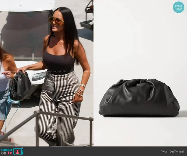 Bottega Veneta The Pouch Leather Clutch worn by Lisa Barlow on The Real Housewives of Salt Lake City