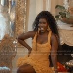 Bozoma’s orange braided strap mini dress on The Real Housewives of Beverly Hills