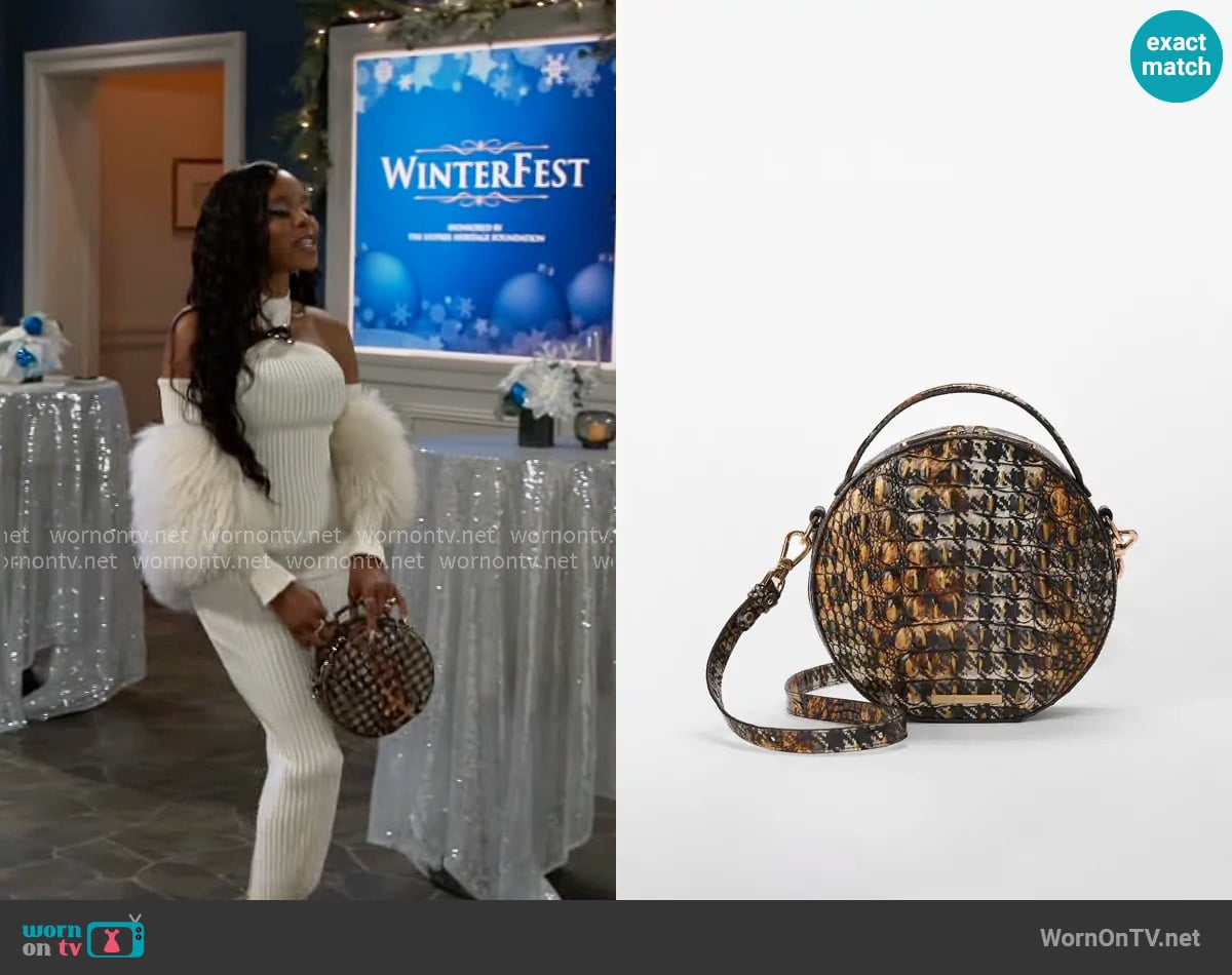 Brahmin Lane Bag in Untamed Melbourne worn by Hayley Lawson (Marquita Goings) on Beyond the Gates