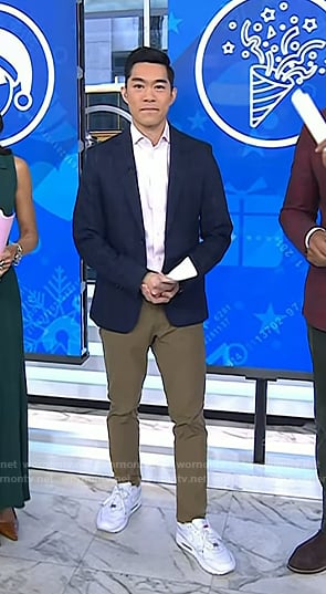 Brian Cheung’s white sneakers with red tag on Today