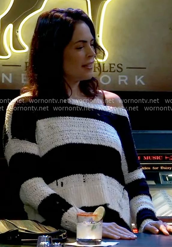 Britt’s striped one-shoulder sweater on General Hospital