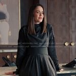 Carr’s black midi dress with wide belt on Alls Fair